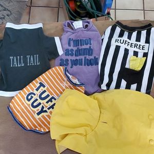 Small dog clothes. Fit my 9 pounder perfectly. Smoking pet home